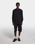 Overshirt nera in frescolana con maniche lunghe