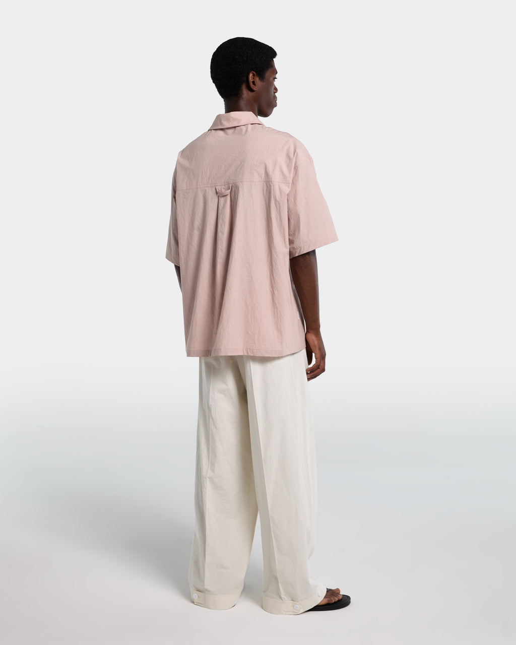 Camicia in popeline rosa con zip e maniche corte
