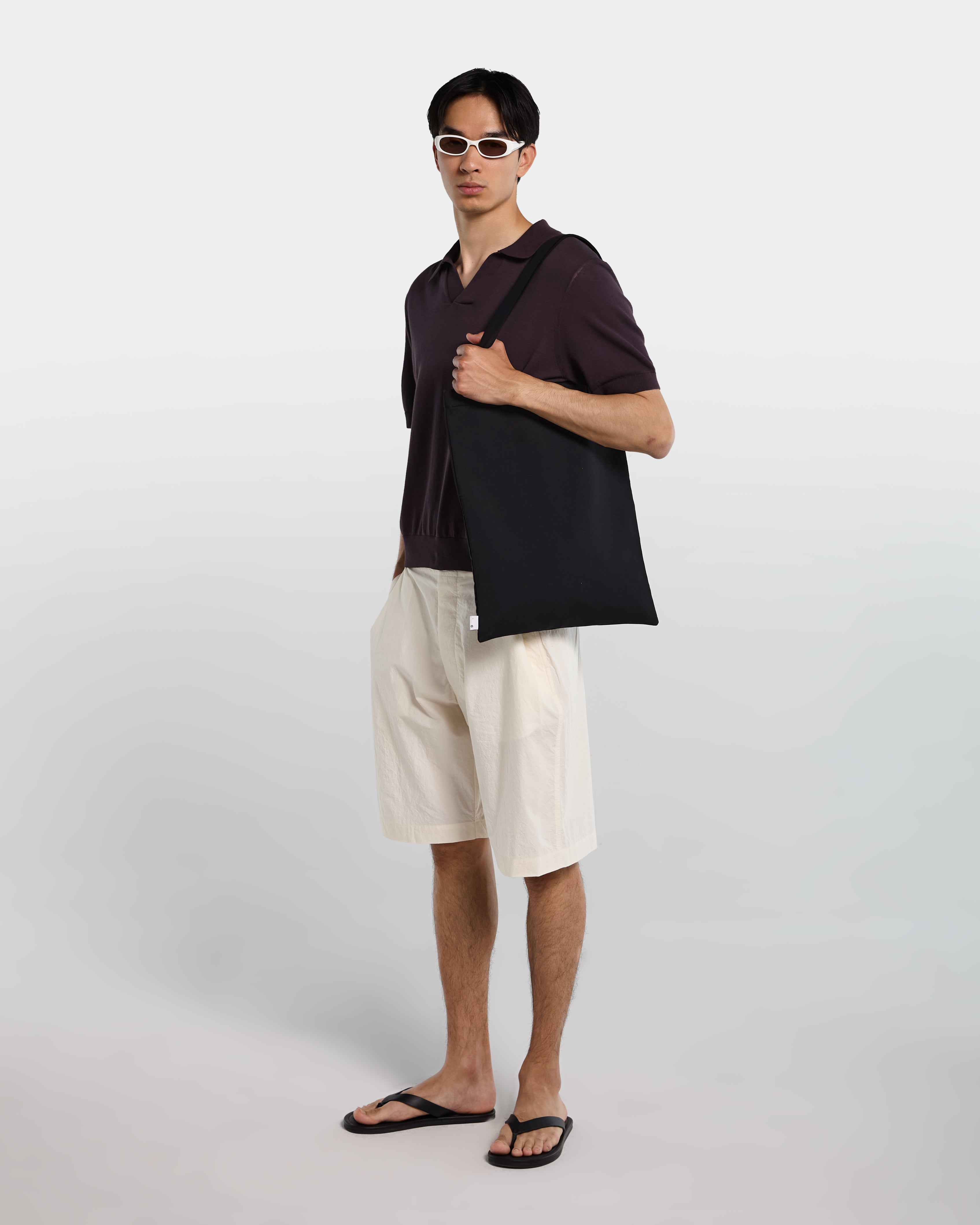 Polo in cotone marrone con collo aperto