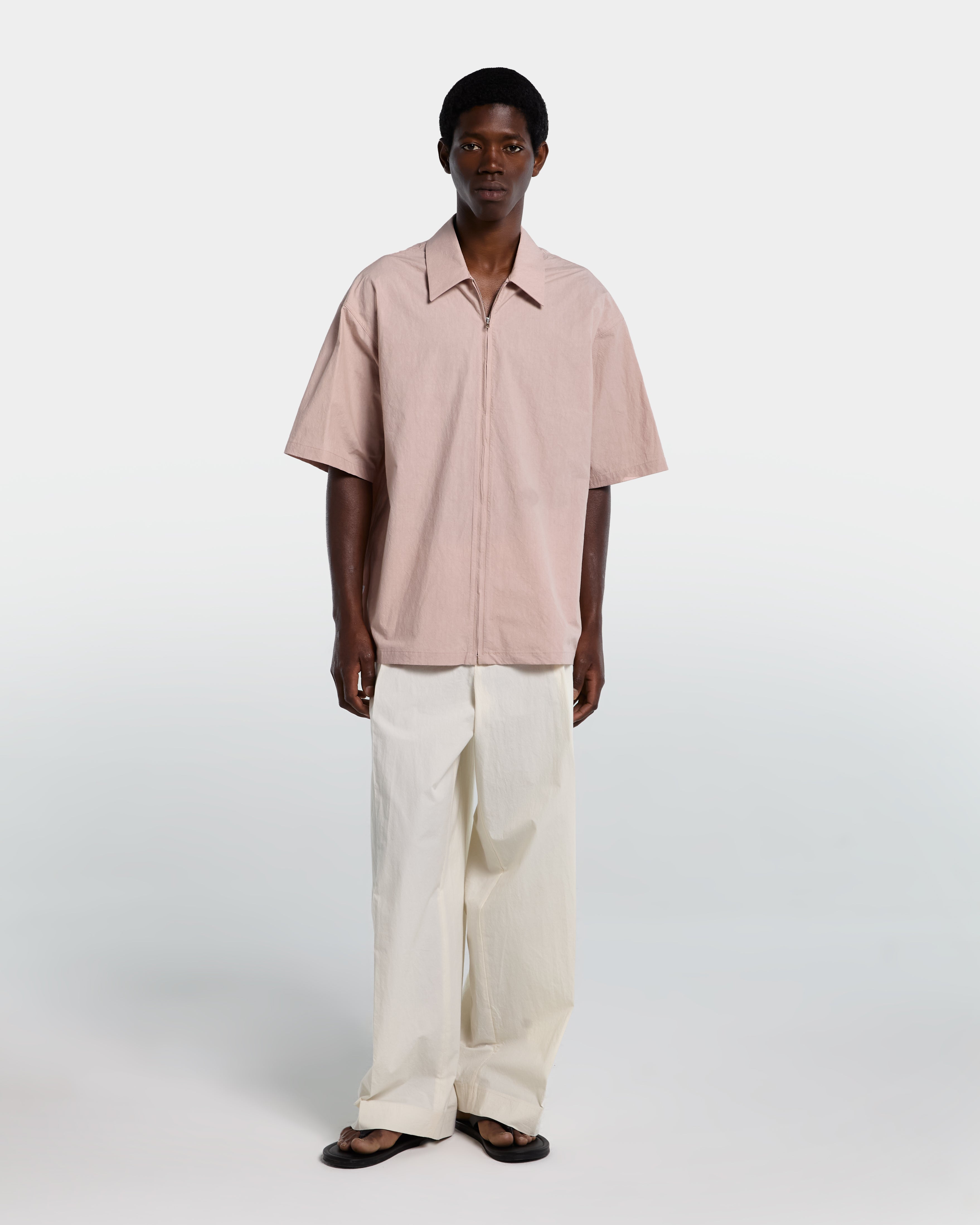 Camicia in popeline rosa con zip e maniche corte