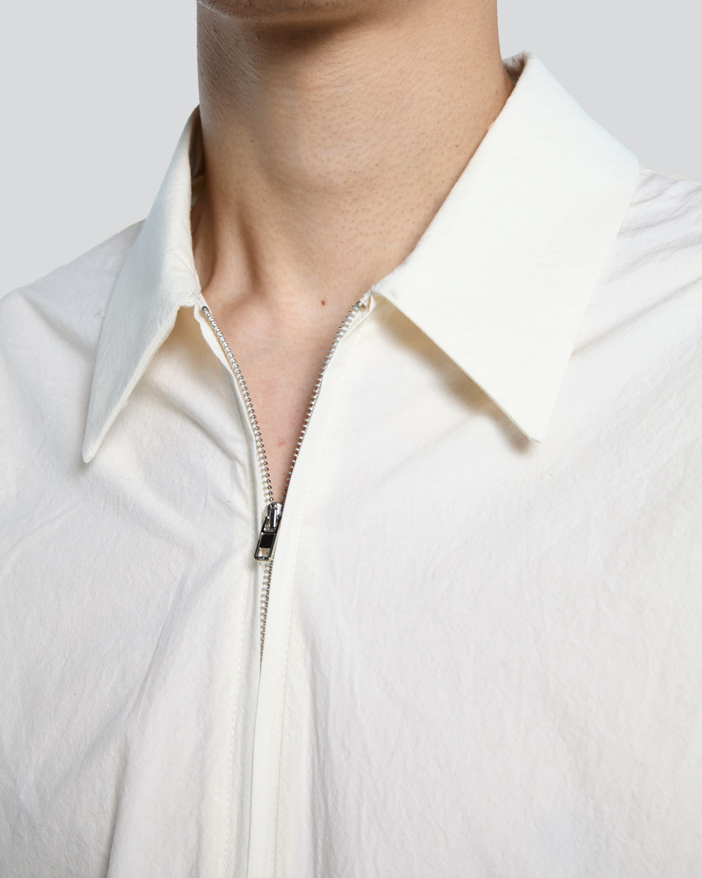 Camicia in popeline panna con zip e maniche corte