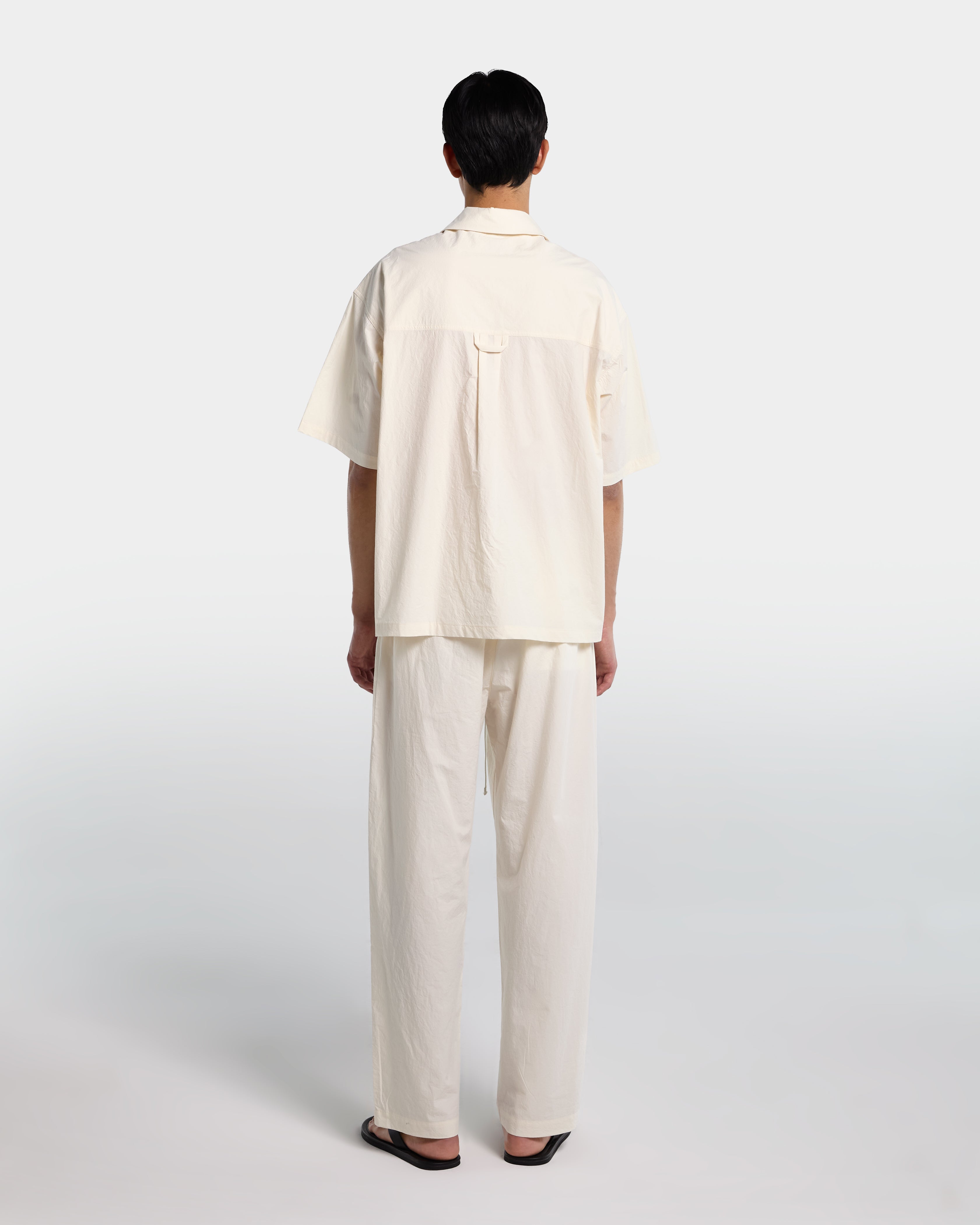Camicia in popeline panna con zip e maniche corte