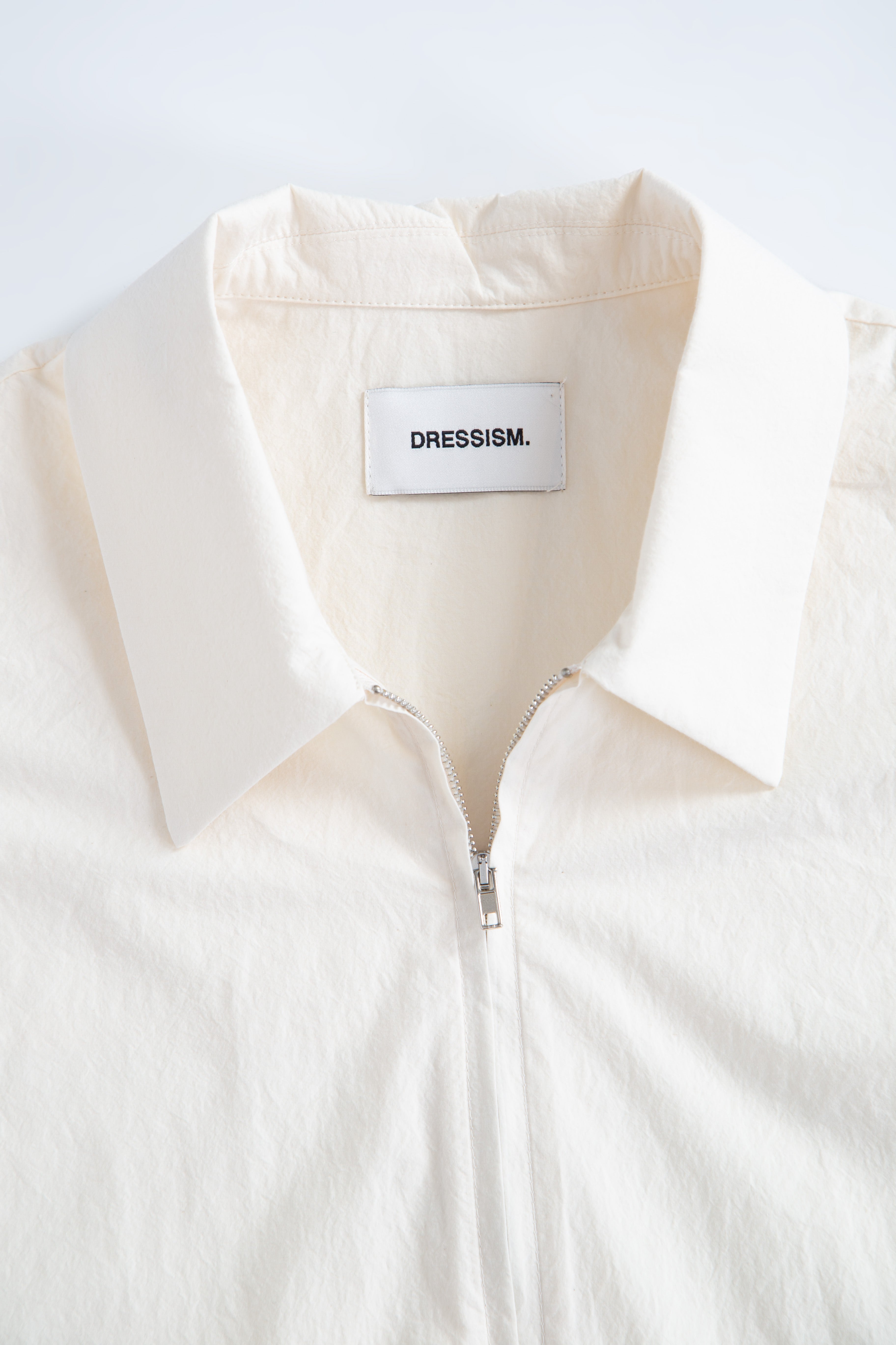 Camicia in popeline panna con zip e maniche corte