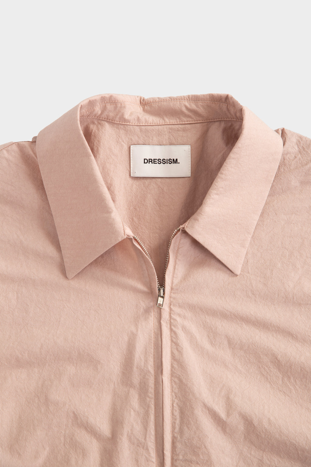 Camicia in popeline rosa con zip e maniche corte