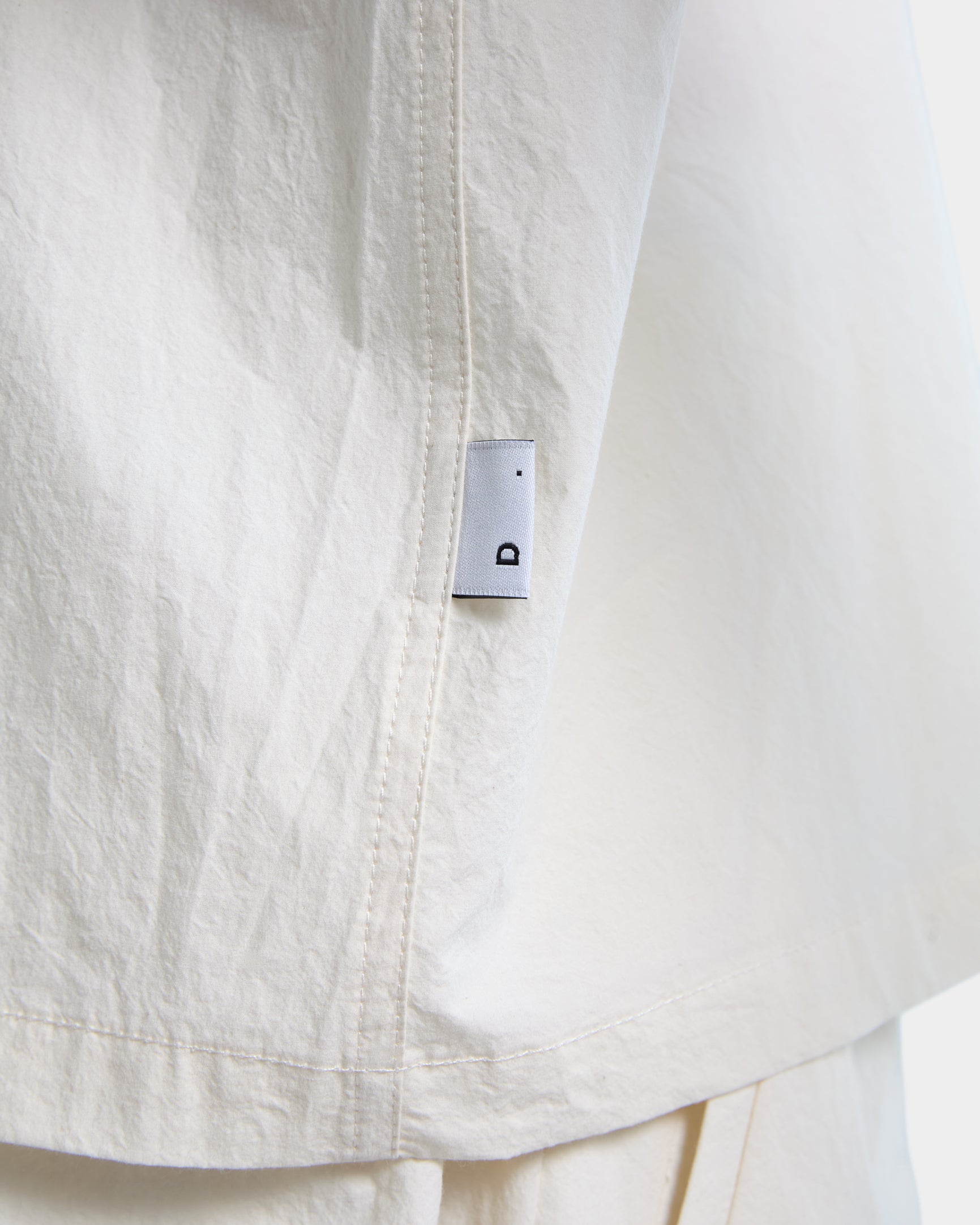 Camicia in popeline panna con zip e maniche corte